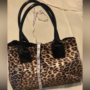 Animal Print Tote Bag snaps on both sides very spacious 
15w 13h
